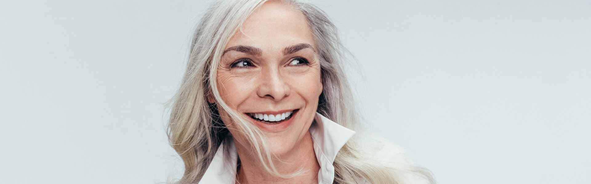 how your smile benefits by having dental implants